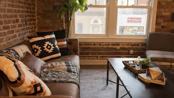 Standard Apartment, 1 Bedroom | Living area | 32-inch TV with digital channels