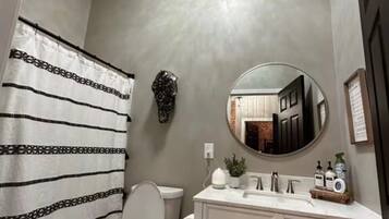 Hair dryer, towels, soap, shampoo