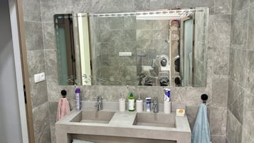 Hair dryer, towels, soap, shampoo