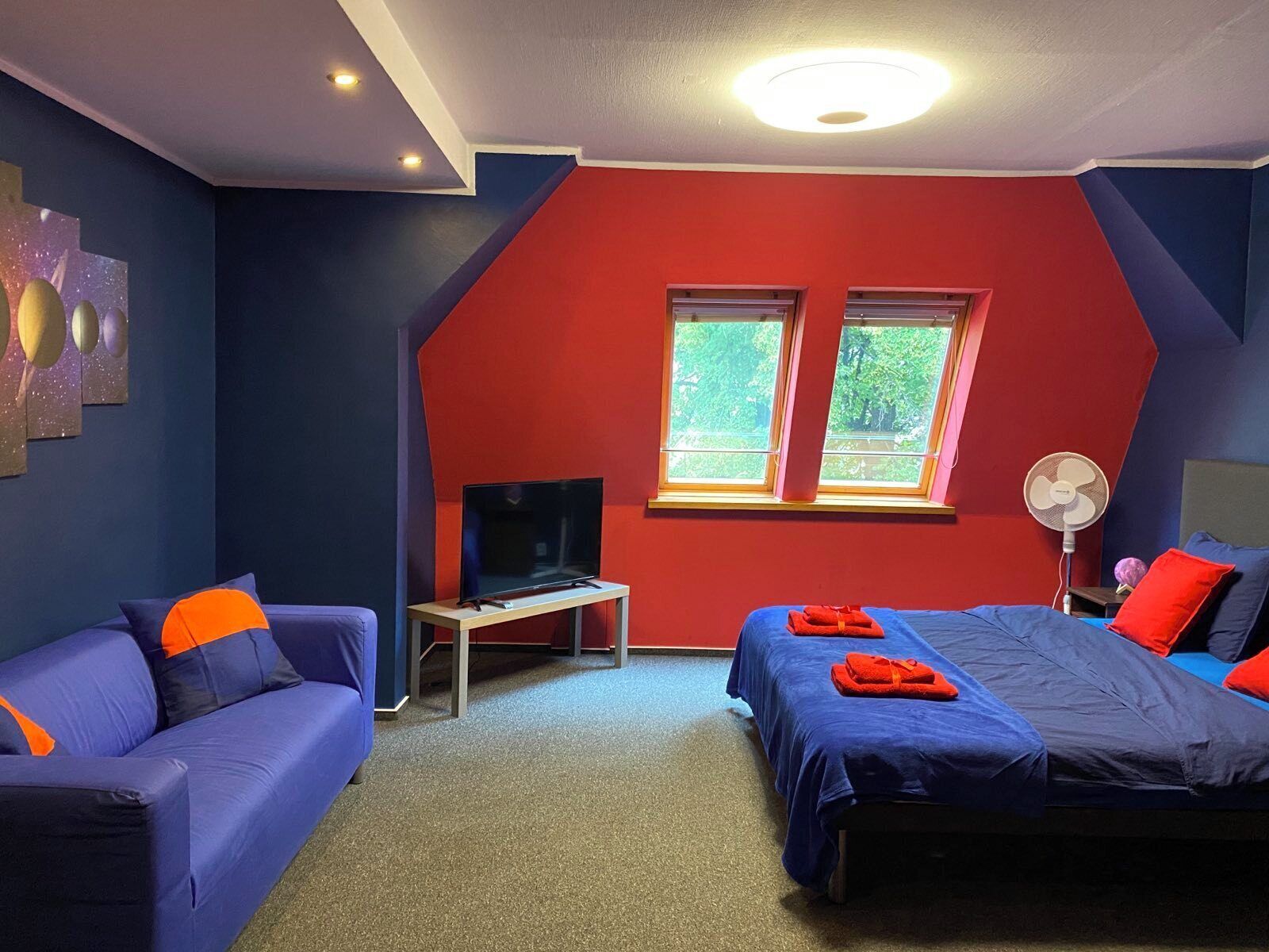 Kolmen hengen deluxe-huone