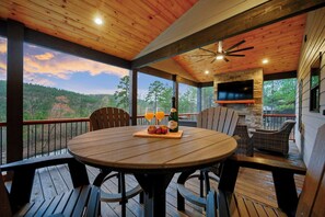 Outdoor dining - The Overlook on Boulder Creek| Luxury Cabin w/ Heated Pool, Sports Court, Sauna & ATV Access (Broken Bow)
