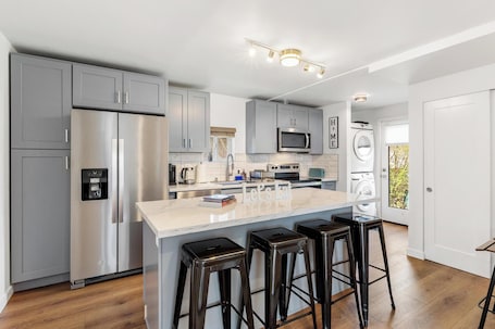 Microwave, oven, stovetop, dishwasher. The Burien Modern Cozy - Near Airport & Amenities 2 Bed 1 Bath With AC