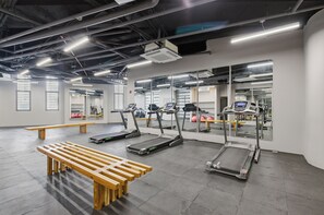 A gym with treadmills, benches, and exercise balls. - New and modern apartment near the beach (El Rodadero)