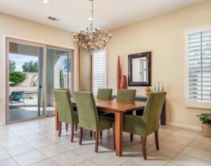Dining - 3-bedroom house option in soothing Indio with cool AC and gym access (Indio)