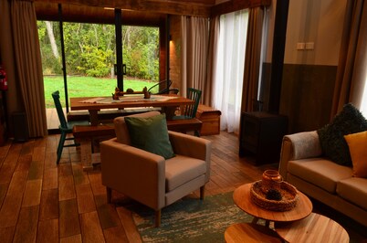 Rümü: Cabin in native forest with view of the volcano.