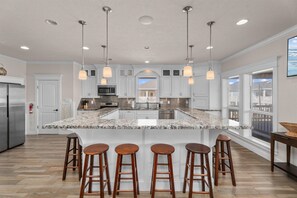 Fridge, microwave, oven, stovetop - Beachfront 11BR Duo Retreat | Sleeps 67 | Hot Tubs and Pickleball Court (Crystal Beach)