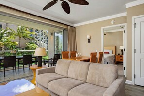 A hotel room with a balcony, a sofa, a dining table, and a bed. - 2 Honua Kai Villas | Ocean Front | Sleeps 10 | Free Car w/ 6+ Nights | ML-2717 (Lahaina)