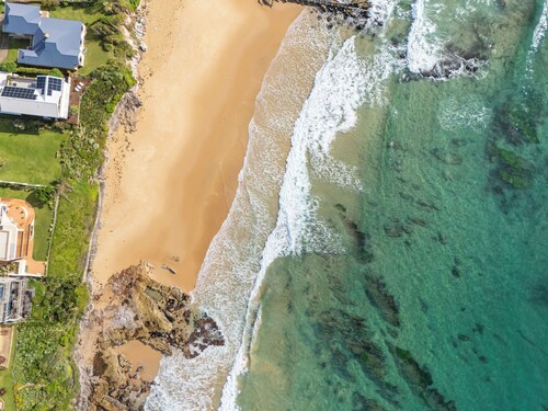 Luxury 2BR Getaway • Scenic Terrace & Views • Car-Free • Walk to Train/Beach