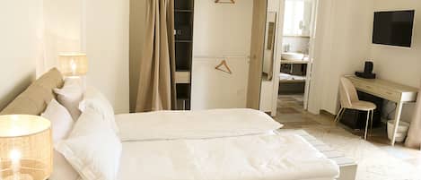 Desk, free WiFi, bed sheets