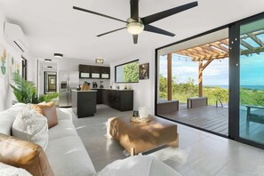 TV, offices - Coastal Bliss | Oasis with Pool & Ocean Views (Aguada)