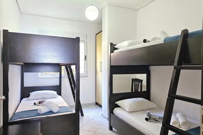 A room with two bunk beds, a desk, and a chair. - Two Bedroom Apartment With Sea View-061, Sarandë, Albania (Sarandë)