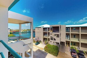 Property grounds - Steps from the sea third-floor apartment with shared pool & ocean-view balcony (San Pedro)