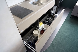 A kitchen with a built-in dishwasher, a sink, and a countertop. - HUBEX AKIHABARA (Tokyo)