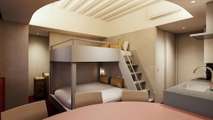 Una cama litera con escritorio y silla, una escalera, un lavamanos y una lámpara en el techo.