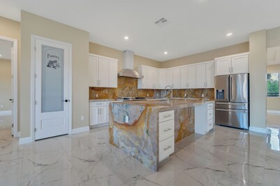 Spacious 5-bedroom villa in half acre lot in Las Vegas with RV Garage