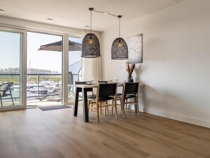 Dining - Stylish harbour apartment with balcony & view (Kortgene)