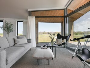 TV - Beautiful nature house with terrace by the water (Wissenkerke)
