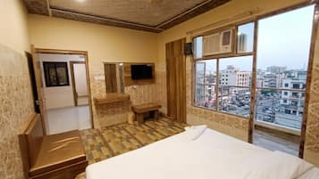 Quarto luxo, vista para a cidade