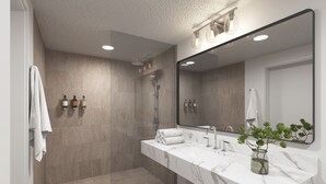 A modern bathroom with a glass-enclosed shower, a marble vanity, and a large mirror. - Beachside Boutique Hotel + Pool + Hot Tub + Rooftop| The Mara by AvantStay (Laguna Beach)