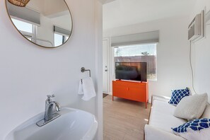 TV, fireplace, books - Pet-Friendly Desert Retreat w/ Hot Tub in Landers! (Landers)