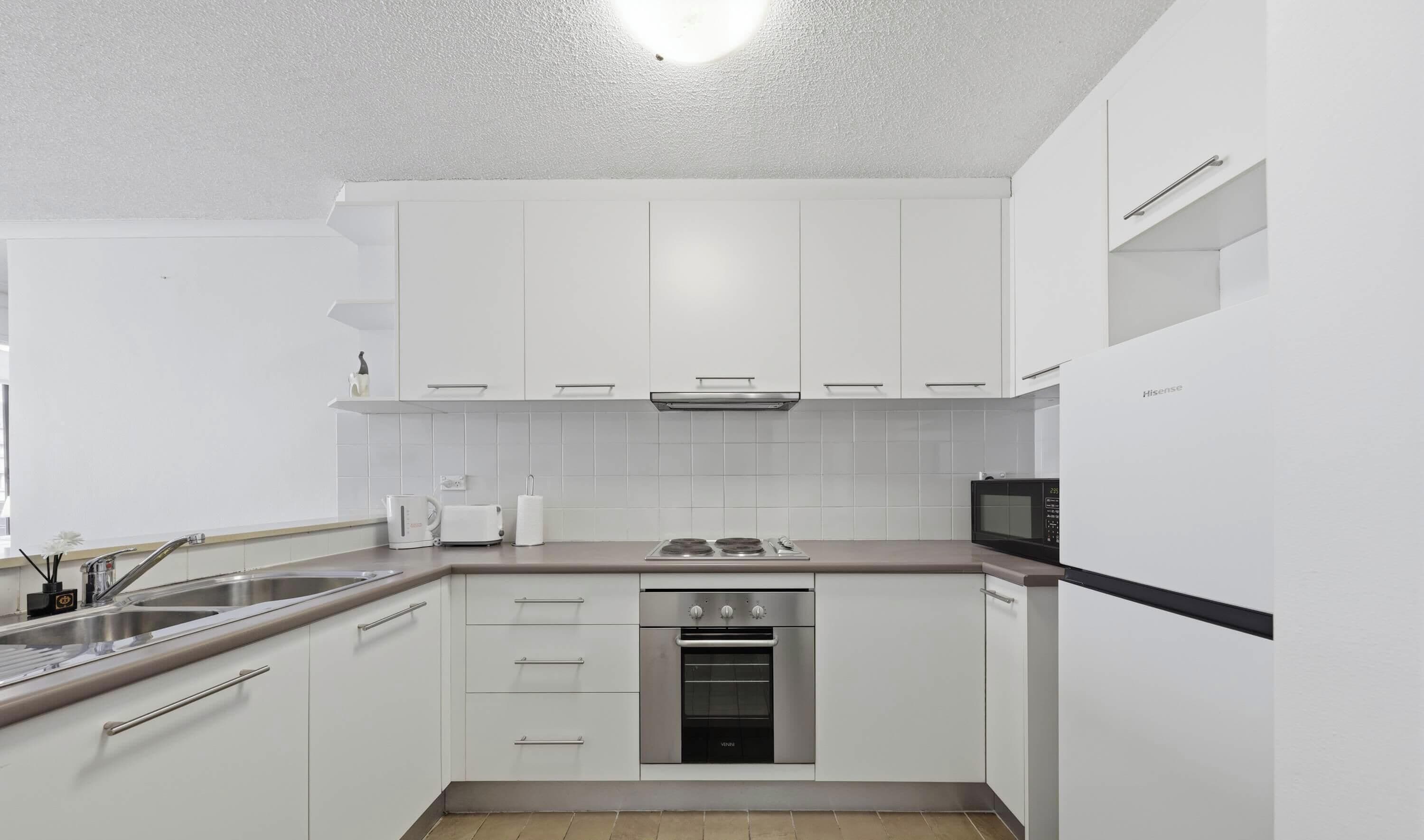 Fridge, microwave, stovetop, coffee/tea maker
