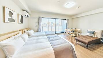 Family Apartment, Lanai, City View | Blackout drapes, iron/ironing board (on request), WiFi (free)