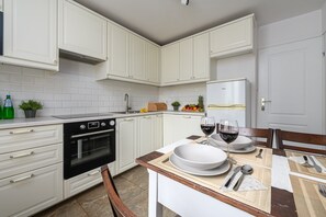 Classic Apartment, City View | Private kitchen - Cozy Apartment with balcony near Museum (Warsaw)