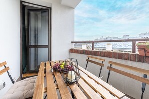 Classic Apartment, City View | Outdoor dining - Cozy Apartment with balcony near Museum (Warszawa)