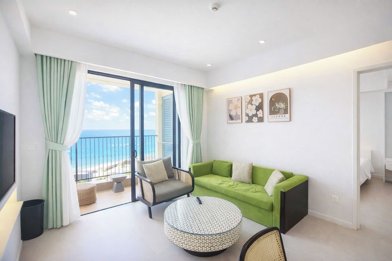 Deluxe Apartment, 2 Bedrooms, Balcony, Ocean View | Desk, laptop workspace, blackout curtains, iron/ironing board
