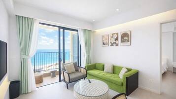 Deluxe Apartment, 2 Bedrooms, Balcony, Ocean View | Desk, laptop workspace, blackout curtains, iron/ironing board