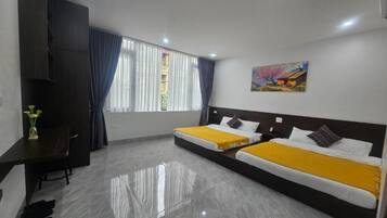 Deluxe fyrbäddsrum - utsikt mot staden