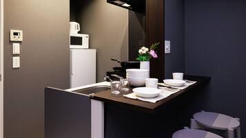 Full-size fridge, microwave, stovetop, electric kettle
