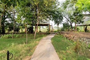 Studio Deluxe - utsikt mot trädgården | Boendeområde