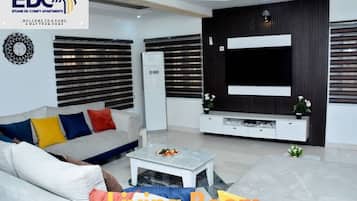 Apartamento família | Área de estar