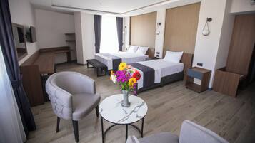 Deluxe driepersoonskamer, balkon