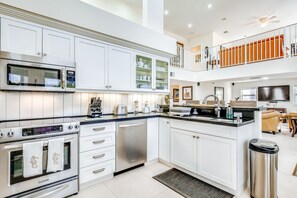 Fridge, microwave, oven, stovetop - Waterfront home with amazing views, boat dock, screened porch & water sport gear (Key Largo)