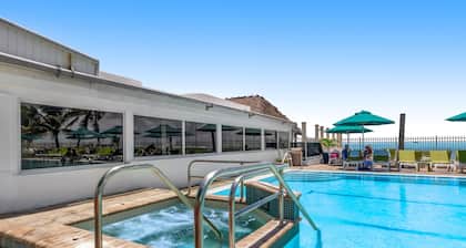 Canal-front home with Cabana Club access, water view, & private W/D