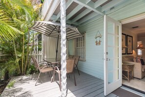 Outdoor dining - Beautiful Condo with Deck, Patio, & Pool - Walk to Duval Street & Beaches (Key West)