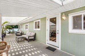 Terrace/patio - Bayfront bungalow with private dock, kayaks, SUPs, tiki hut & pool access (Key West)