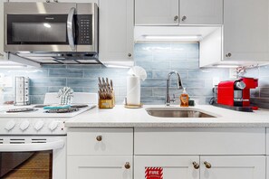 Fridge, microwave, oven, stovetop - Charming, updated home near Duval St. with enclosed patio & walkable location (Key West)