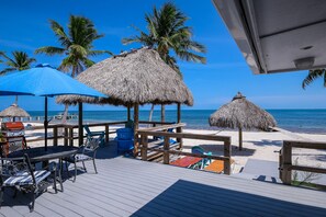 Outdoor dining - Oceanfront Duplex with Beautiful Beach & Dock for Boat Access - Dogs OK (Long Key)