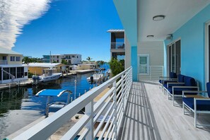 Property grounds - Sprawling waterfront home with pool, outdoor kitchen, game table, grill, & W/D (Key Largo)
