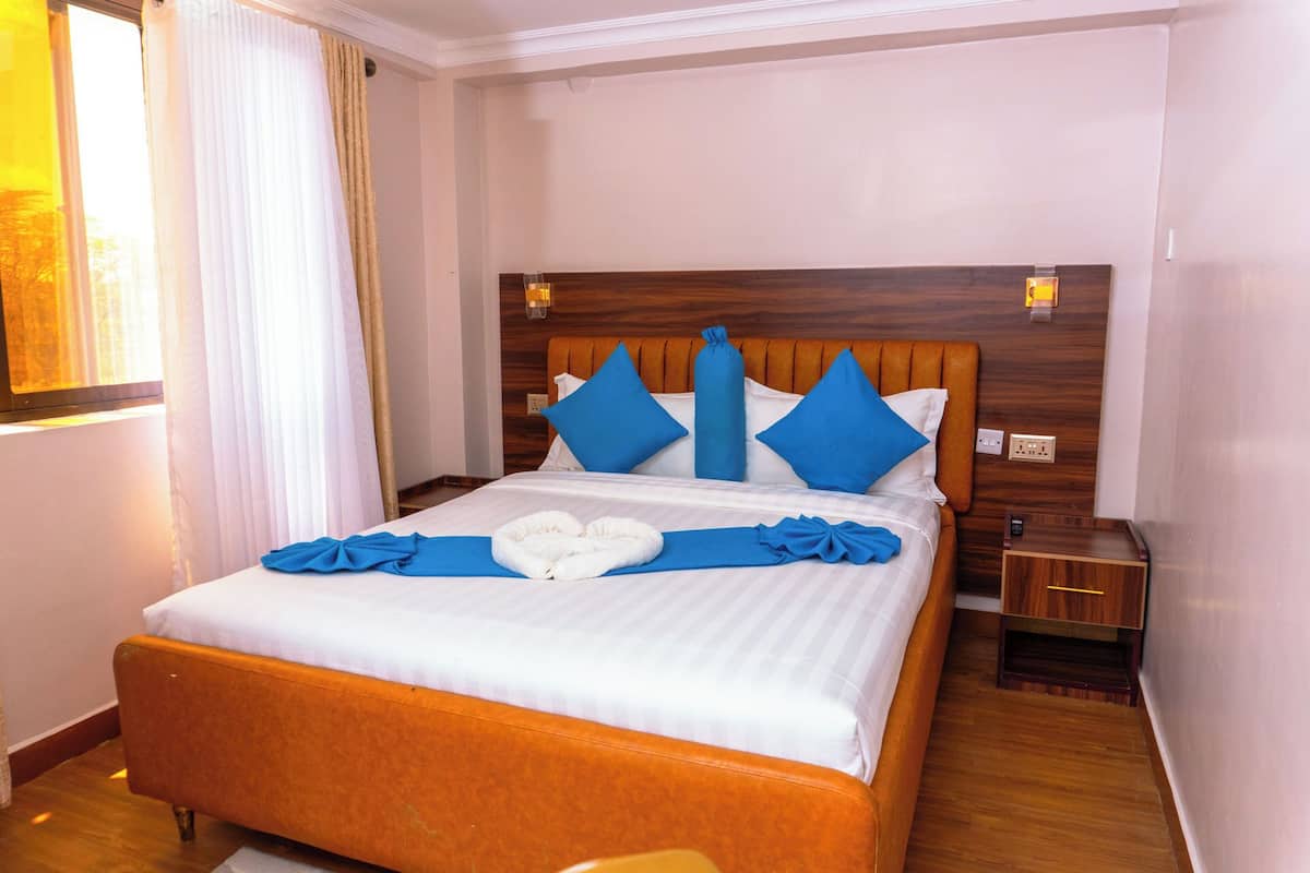 Standard Single Room, Balcony, Garden View