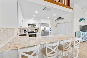Private kitchen - Waterfront home with dock, filet station, patio, balcony, & Cabana Club access (Key Colony Beach)
