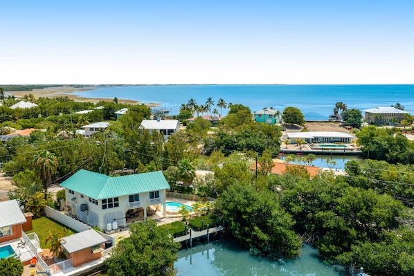 Exterior - Waterfront hideaway with dock, pool & inviting patio - walk to Sombrero Beach (Marathon)