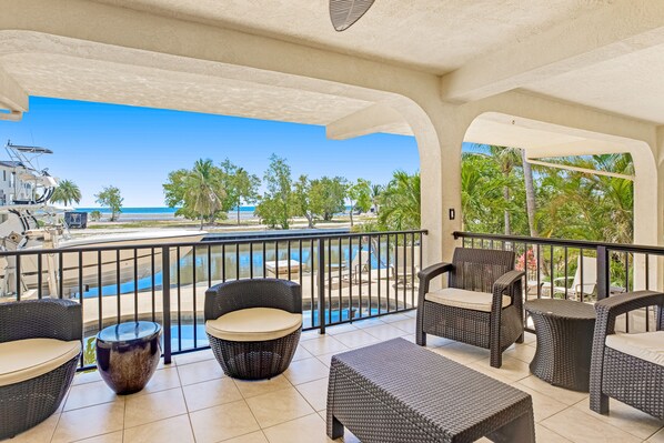 Terrace/patio - Waterfront home with ocean views, dock, & private outdoor pool (Marathon)