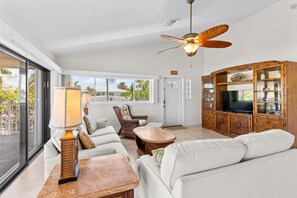 TV, books - Waterfront home with 35-ft dock & access to Cabana Club pool & beach (Key Colony Beach)