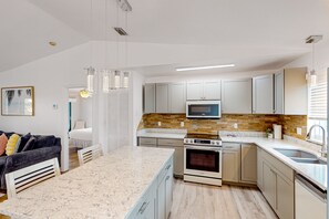 Fridge, microwave, oven, stovetop - Waterfront home with boat/canal access, screened lanai, & renovated interior (Summerland Key)
