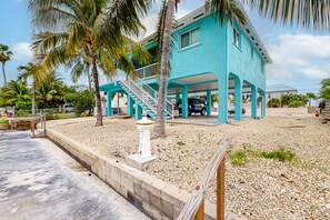 Exterior - Waterfront home with boat/canal access, screened lanai, & renovated interior (Summerland Key)