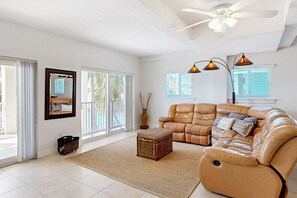 TV, DVD player, books, video library - Waterfront Half-Duplex with 30-Ft. Dock, Sitting Pool, and Private Beach Access (Key Colony Beach)